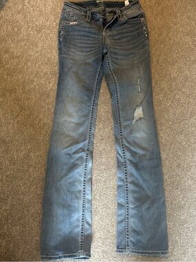 Women's Blue Boot Cut Jeans with Subtle Distressing